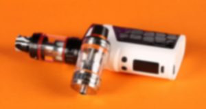 E-cig on orange background