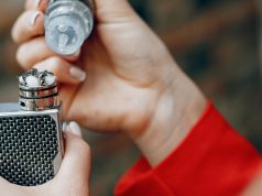 Girl filling her e-cig