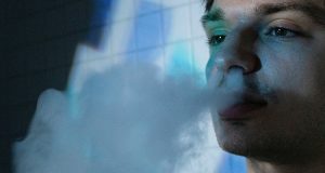 under 21 man vaping