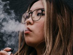young woman vaping