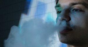 young man vaping