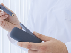 Doctor holding an iQos e-cig