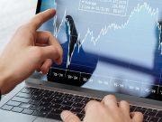 business man checking IPO in his computer