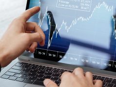 business man checking IPO in his computer