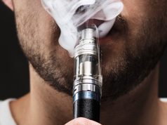 zoom on a man vaping