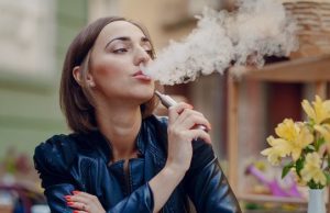 woman vaping outside