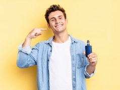 Study on nicotine substitutes: vaping wins by a mile Man smiling while vaping