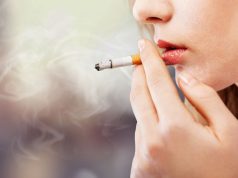 BAT Opens New Biotech Firm Portrait of a girl smoking cigarette