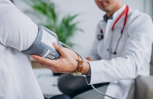 Study Claims Vaping Leads to High Blood Sugar, Diabetes Physician with patient measuring blood pressure