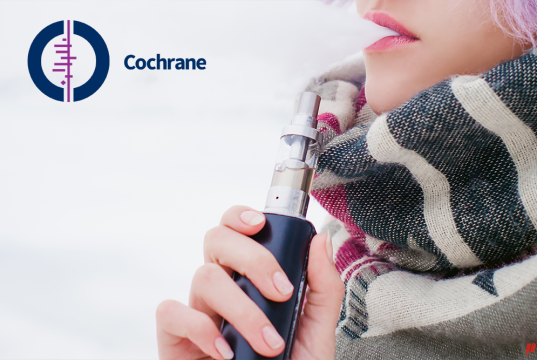 An e-cigarette next to a tobacco cigarette.